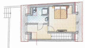 Un plan d’étage d’une chambre d’hôtel comprenant une salle de bain, un petit coin cuisine et un espace salon.