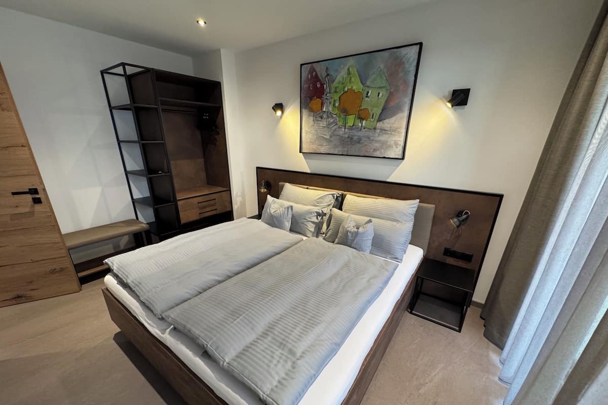 Deluxe Suite, 2 Bedrooms, Patio, City View | In-room safe, free WiFi