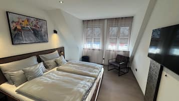 Deluxe penthouse, uitzicht op stad | Een kluis op de kamer, gratis wifi