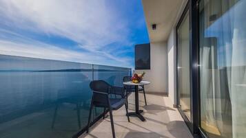 Basic Double Room, Balcony, Sea View | Outdoor dining