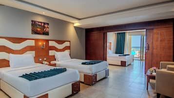 Chambre Familiale, 2 chambres, salle de bains commune | Coffres-forts dans les chambres, bureau, Wi-Fi gratuit