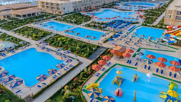 15 outdoor pools, open 8:00 AM to 5:00 PM, pool umbrellas, sun loungers - Rewaya Inn Resort (Hurghada)