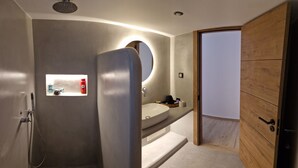 A modern bathroom with a shower, sink, and mirror. - Alya Paros – Calm Cycladic Aesthetic (Paroikia)