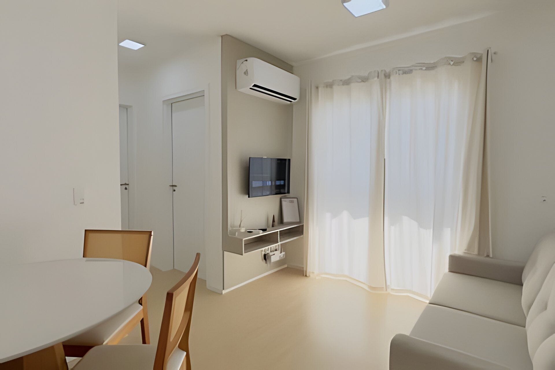 Apartamento conforto | Área de estar | TV de tela plana