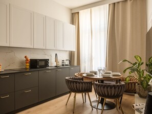 Family Apartment, 3 Bedrooms, Non Smoking, City View | Private kitchenette | Fridge, microwave, cookware/dishes/utensils - Astor Residence by Fragola Apartments (Kraków)