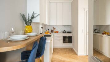 Economy Apartment, 2 Bedrooms | Private kitchen | Fridge, microwave, stovetop, cookware/dishes/utensils