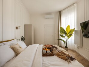 Comfort appartement, 3 slaapkamers, uitzicht op de binnenplaats | Een strijkplank/strijkijzer, gratis wifi