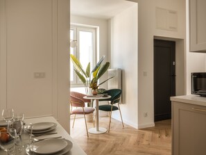 Comfort Apartment, 3 Bedrooms, Courtyard View | Dining room - Astor Residence by Fragola Apartments (Kraków)