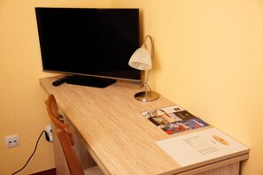 Chambre Quadruple Confort, vue ville | Intérieur