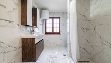 Hair dryer, slippers, towels, soap