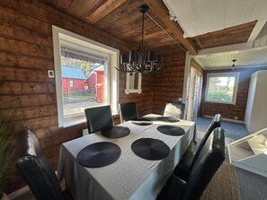 House, 3 Bedrooms, Balcony, Garden View | Dining room - Camp Caroli Villa Aurora (Jukkasjarvi)
