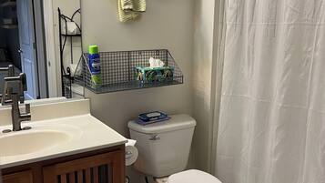 Hair dryer, towels, soap, toilet paper