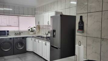 Apartemen Comfort | Dapur pribadi | Ketel listrik