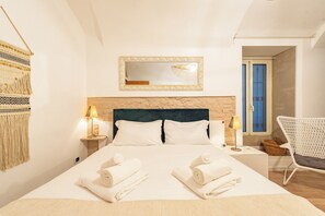 Apartamento (1 Bedroom) | 1 quarto, ferros/tábuas de passar roupa, roupa de cama