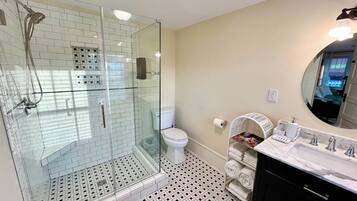 Shower, hair dryer, towels, soap