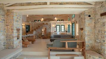 Altamar Villa | Living area | 32-inch Smart TV with digital channels, Netflix, streaming services