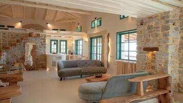 Altamar Villa | Living area | 32-inch Smart TV with digital channels, Netflix, streaming services