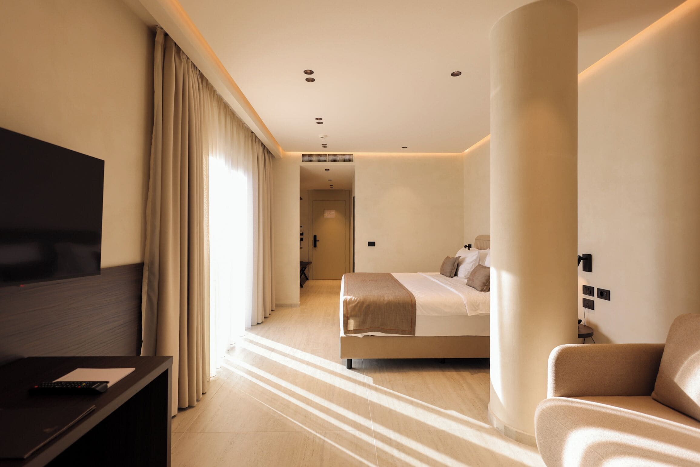 Suite junior | Minibar, caja fuerte, wifi gratis y ropa de cama