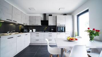 Microwave, toaster, blender, cleaning supplies