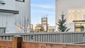 A modern building with a sign for a nail salon and spa. - Modern 3BR Home Edmonton Near by Airport (Edmonton)