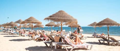 On the beach, white sand