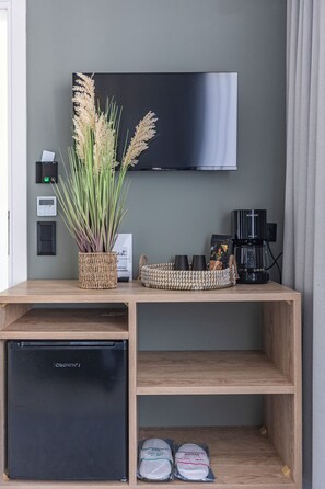 Ropa de cama de alta calidad y minibar 