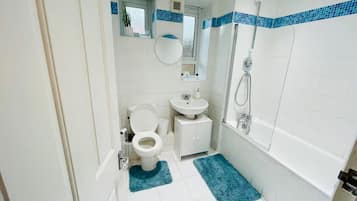 Hair dryer, towels, soap, toilet paper