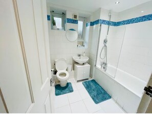 Hair dryer, towels, soap, toilet paper