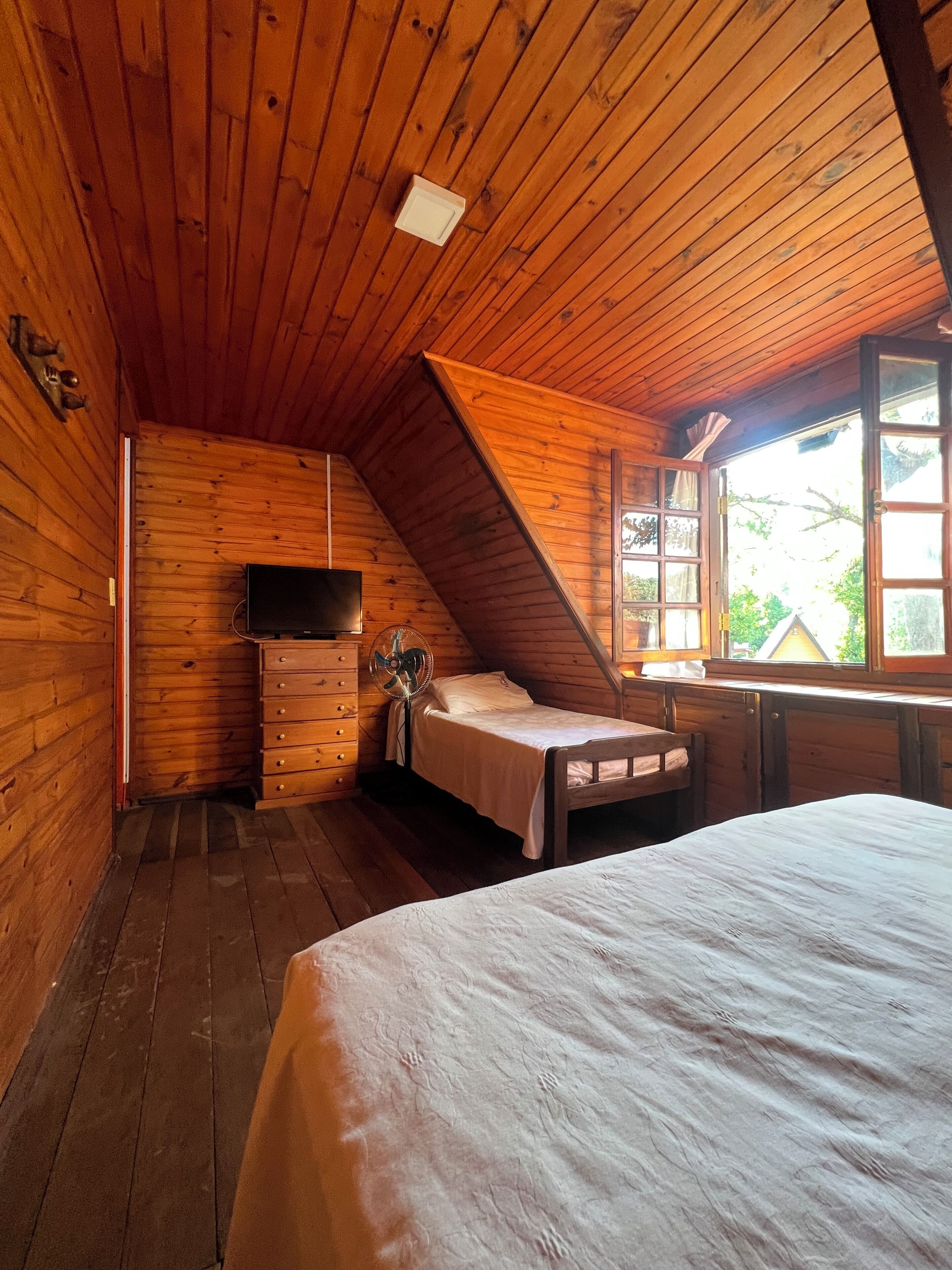 Cabana standard, varanda, vista para o jardim | Cofres nos quartos, Wi-Fi de cortesia