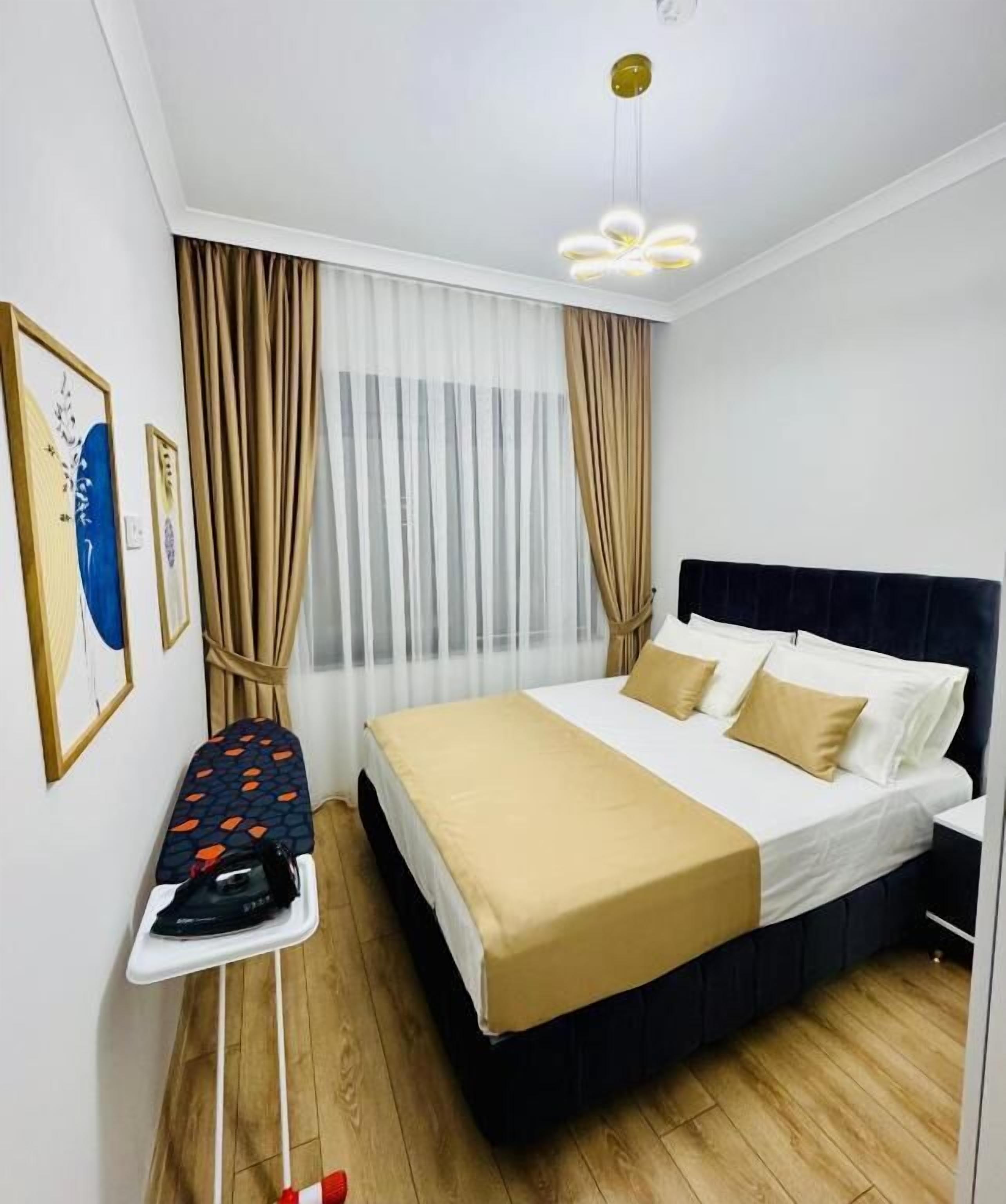 Condo, Balcony, Courtyard View | Iron/ironing board, free WiFi