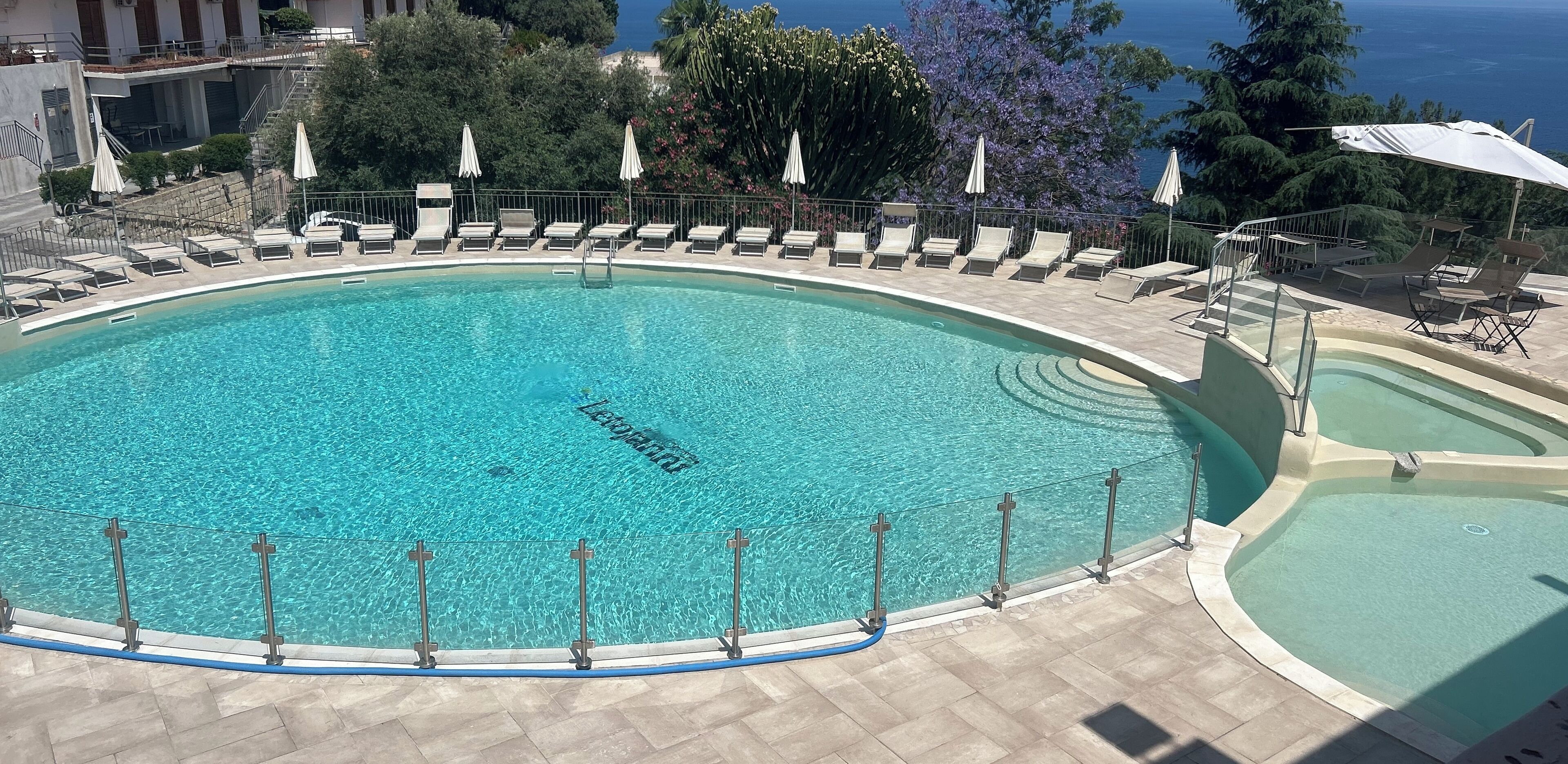 Indoor pool, seasonal outdoor pool, pool umbrellas, sun loungers