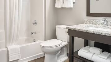 Combined shower/bathtub, hair dryer, towels, soap