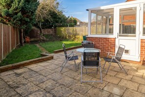 Outdoor dining - Spacious detached home with fireplace, BBQ, and parking (West Yorkshire)