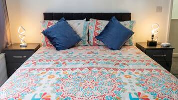 4 bedrooms, desk, iron/ironing board, travel cot