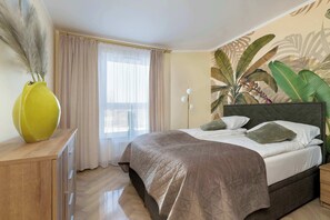 1 dormitorio, tabla de planchar con plancha, cuna de viaje y wifi
