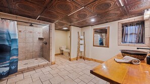 Shower, towels, soap, toilet paper