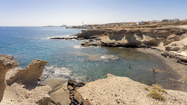 A coastal landscape with rocky terrain and a clear view of the sea. - Home2Book Cozy Sea View Apartment Near the Coast (Arico)