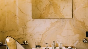 Executive Suite | Bathroom | Hair dryer, towels, soap, shampoo