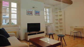 Apartment, City View | Living area | TV