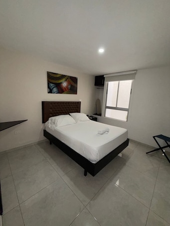 Room | Desk, laptop workspace, iron/ironing board, free WiFi. Nacar Boutique Hotel