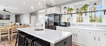 MEGA is a beautiful 3 Bedroom, 2.5 Baths home with private hot tub on 300 acres.