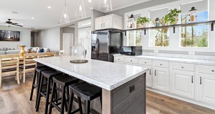 MEGA is a beautiful 3 Bedroom, 2.5 Baths home with private hot tub on 300 acres.