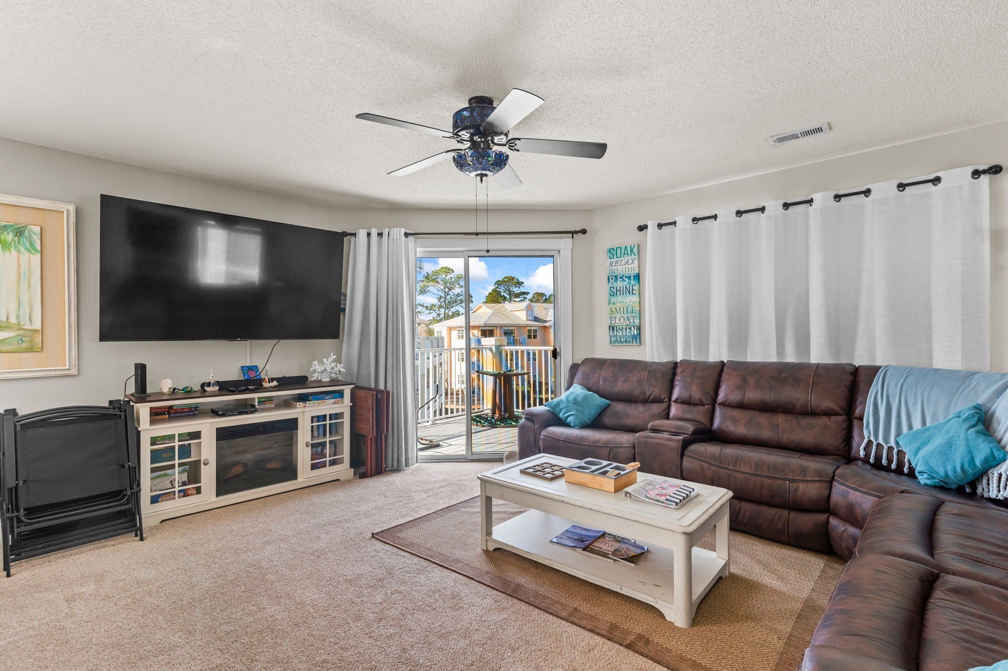 TV, fireplace, books, stereo