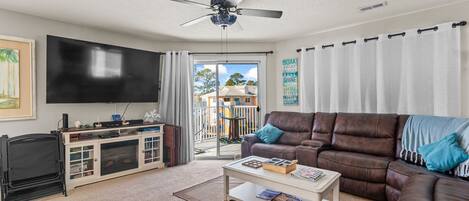 TV, fireplace, books, stereo