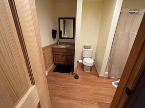 Shower, towels, soap, toilet paper