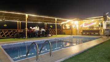 Outdoor pool, open 9:00 AM to midnight, sun loungers