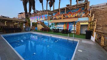Outdoor pool, open 9:00 AM to midnight, sun loungers