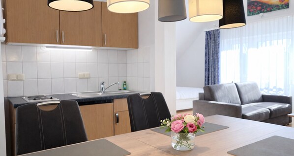 Unclassified image, 1 of 6, button - Welcome to “Strandmuschel” – the largest of our cozy one-room apartments. (Ostseebad Binz)