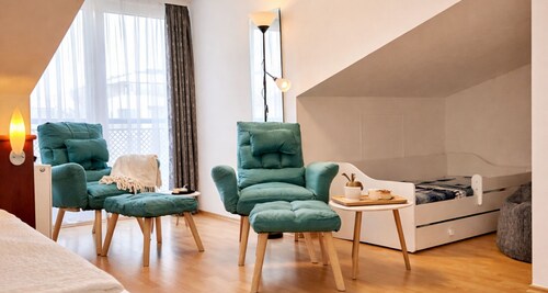Welcome to “Strandhöhle” – your small and cozy hideaway under the roof.