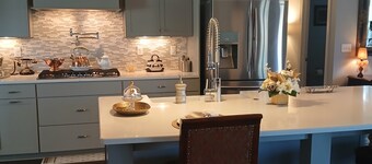 Master's Week -- Elegant 4-bedroom house in Evans with luxurious living spaces!